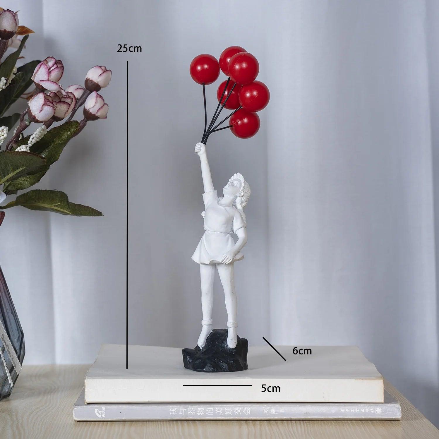 Estatueta Menina Voando com Balão