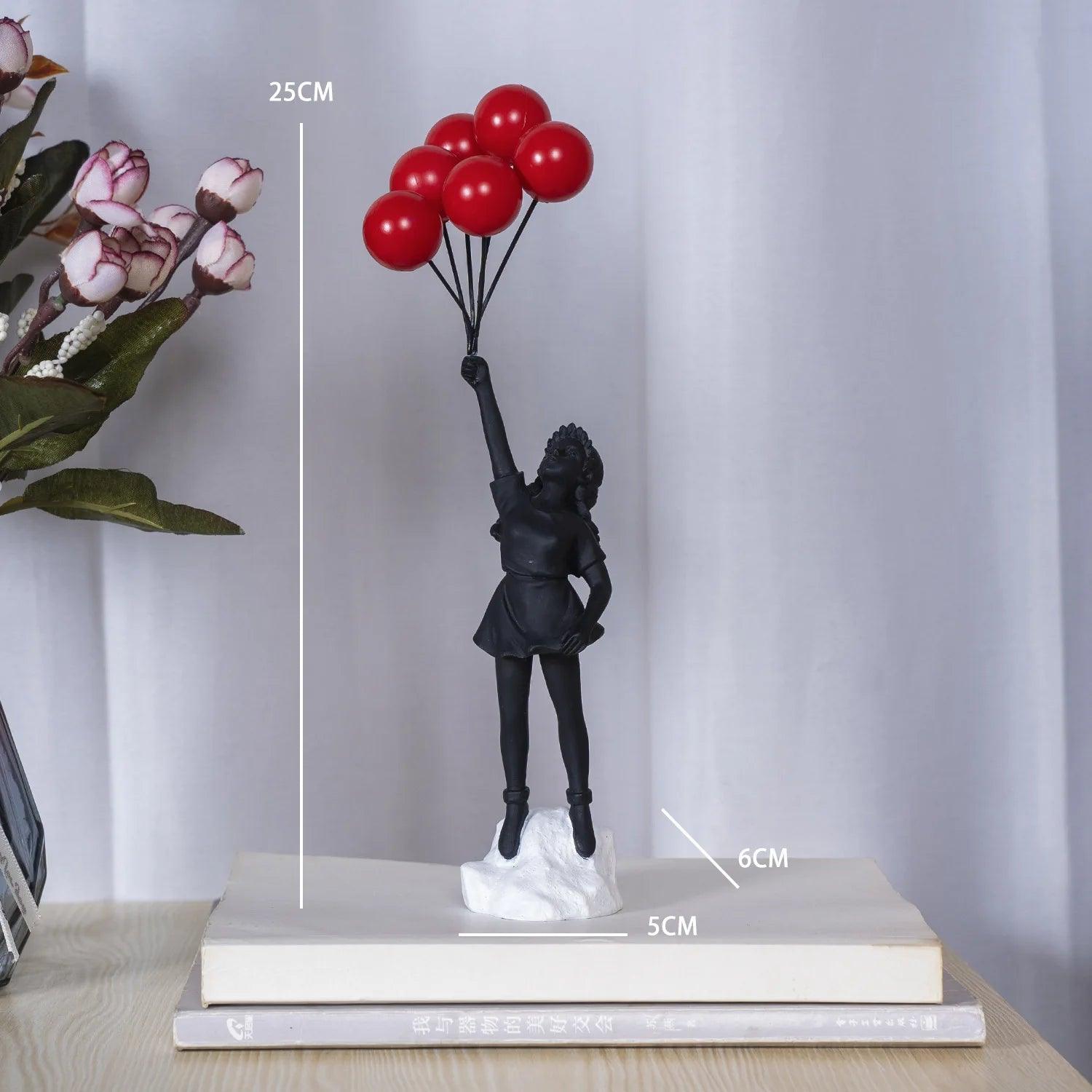 Estatueta Menina Voando com Balão
