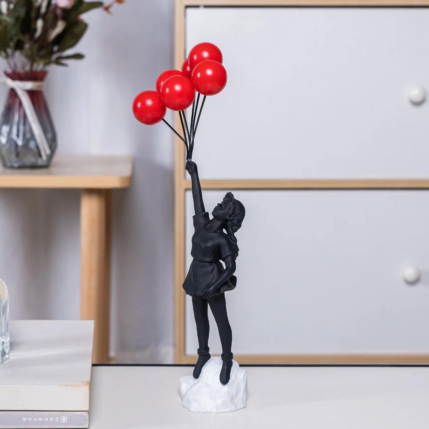 Estatueta Menina Voando com Balão