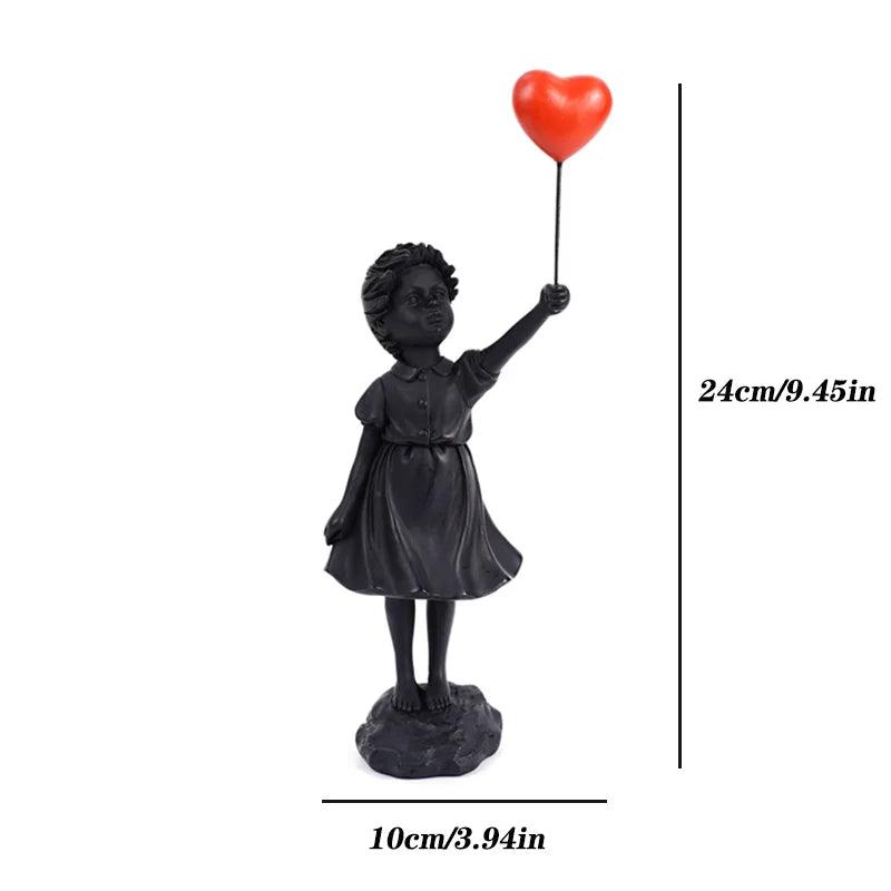 Estatueta Menina Voando com Balão