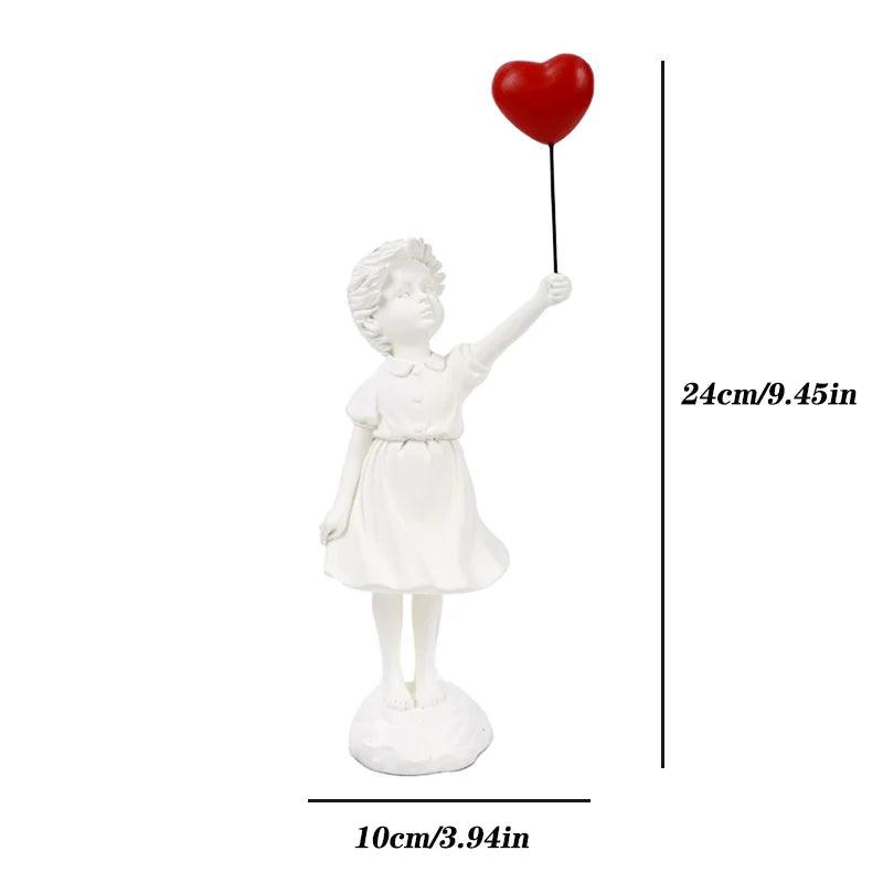 Estatueta Menina Voando com Balão