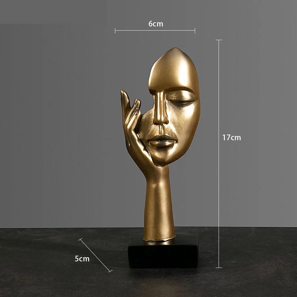 Estatueta rosto em máscara