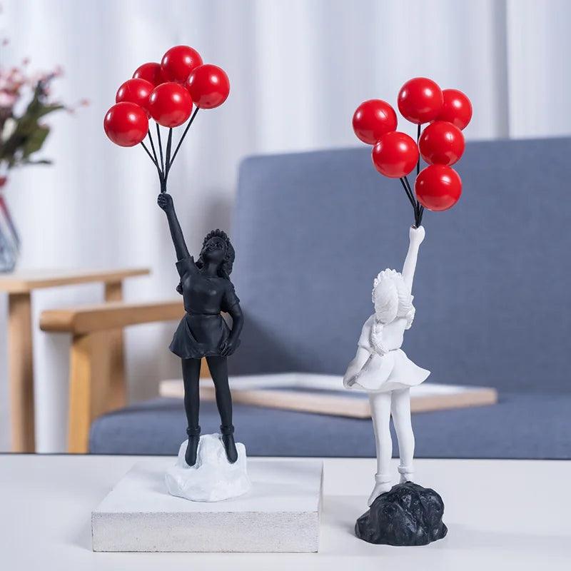 Estatueta Menina Voando com Balão